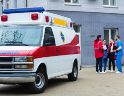 group of medical team and a car